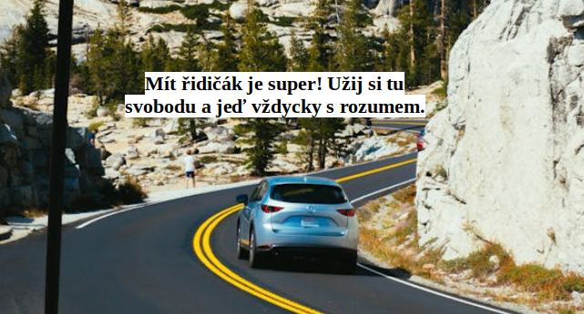 Auto na silnici u bílé skály